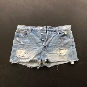 Women’s distressed denim shorts.